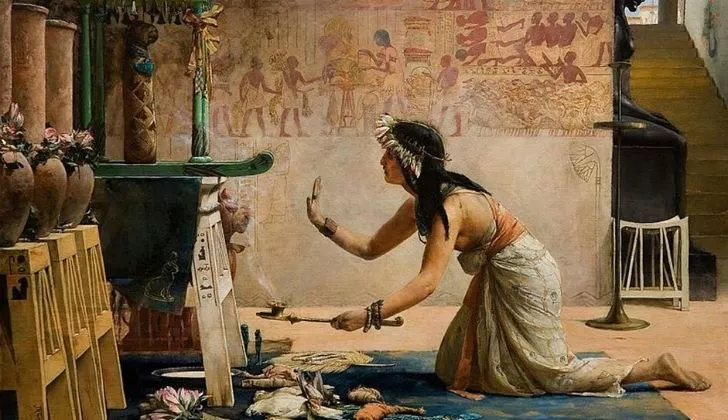 Древнеегипетская женщина, поклоняющаяся кошкам