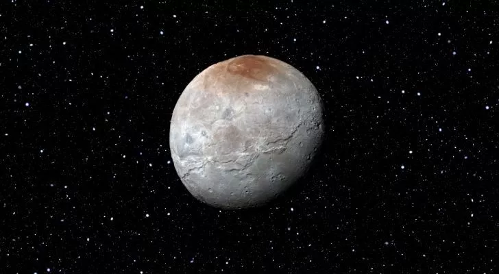 Темная область на северном полюсе луны Плутона, Харона, называется Мордором